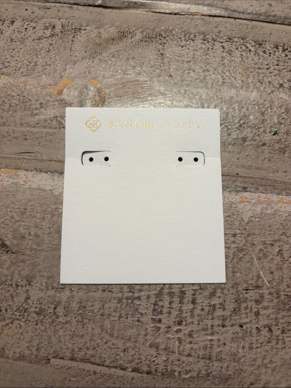Kendra Scott White and Gold Jewelry Display Card